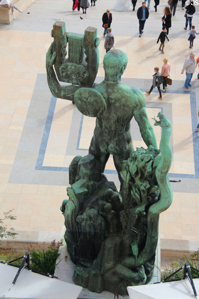 Apollon Musagète sculpture (1937) by Henri Bouchard seen from rear beside northern wing of Palais de Chaillot. Paris, France.