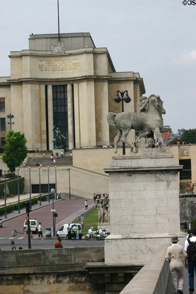 Greek warrior statue (1853) by François Devault on Pont d'Iéna (1814) with Palais de Chaillot beyond. Paris, France.