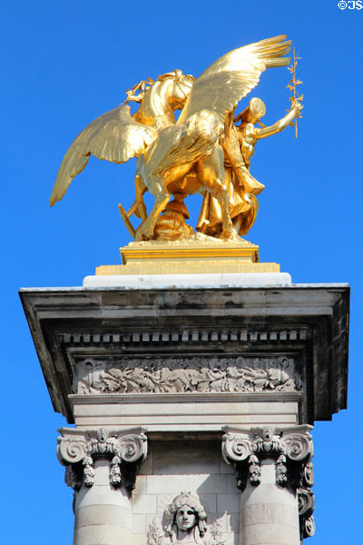 Fame of Sciences restraining Pegasus sculpture (1900) by Emmanuel Frémiet on Pont Alexandre III. Paris, France.