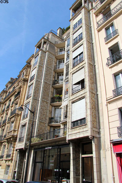 Apartment building projecting forward from usual flat facade plane of Paris for more light (c1904) (25 bis rue Franklin). Paris, France. Architect: Auguste Perret & Gustave Perret.