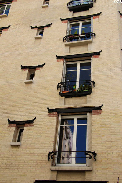 Art Nouveau windows at Immeuble Jassedé (1903-5) (142 ave. de Versailles). Paris, France. Architect: Hector Guimard.