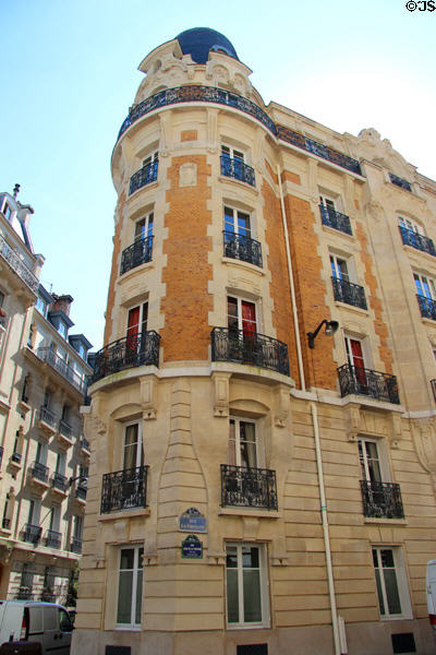 Rounded corner building with tower on rue Jean de la Fontaine (c1900). Paris, France.
