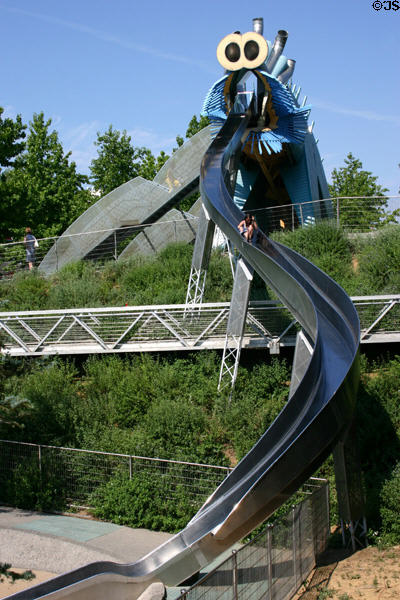 Giant playground slide in form of dragon at Parc de la Villette. Paris, France.