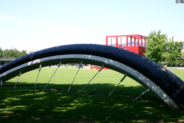 Tire of Buried Bicycle sculpture (1990) by Claes Oldenburg at Parc de la Villette. Paris, France.