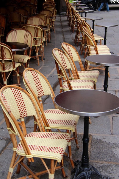 Chairs at sidewalk cafe in Paris. Paris, France.