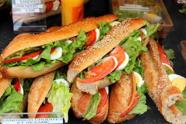 Long premade sandwiches in charcuterie. Paris, France.