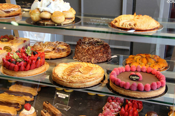 Flans & treats at pastry shop. Paris, France.