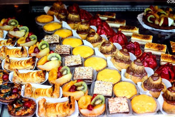 Rows of desserts at pastry shop. Paris, France.