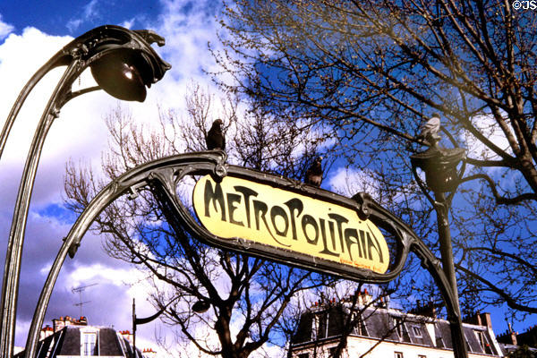 Details of Metropolitain sign & flower lights of Paris Metro entrance. Paris, France. Architect: Hector Guimard.
