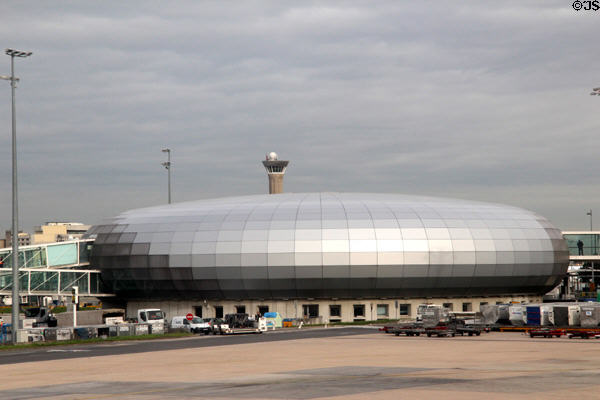 Round terminal with mirrored surface at Charles-de-Gaulle Airport. Paris, France.