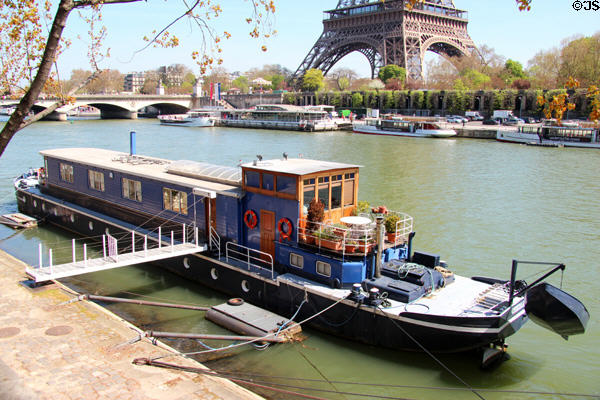 Houseboat on Seine near Eiffel Tower. Paris, France.