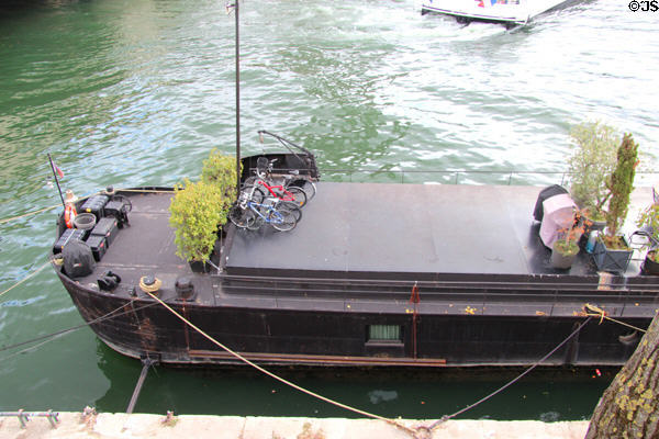 Bicycle parking on houseboat on Seine. Paris, France.