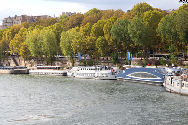 Tourboats docked on Seine. Paris, France.