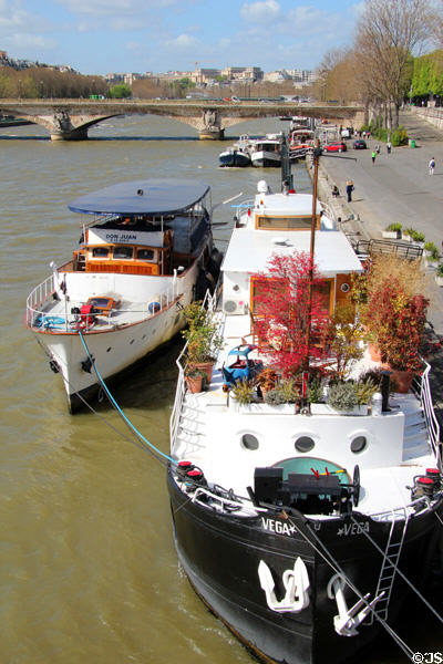 Houseboat with yacht on Seine. Paris, France.