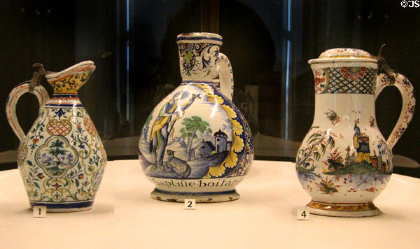 Three ceramic pitchers (1730-40) made in Rouen at Museum of Decorative Arts. Paris, France.