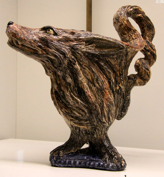 Ceramic ewer in form of wolf's head emerging from rustic wood (1860-70) by Charles-Joseph Landais of Tours, France at Museum of Decorative Arts. Paris, France.