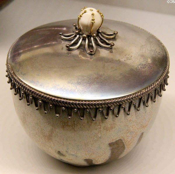 Ceramic pot (c1910-14) by Auguste Delaherche of Paris with silver cover by Charles Rivaud at Museum of Decorative Arts. Paris, France.
