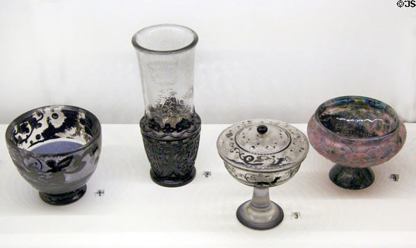 Four glass vessels: 1. my chimera heritage; 2. thick matrix of wisdom could extract me like a pure vase; 3. cup of black sorrow sweet amethyst console; & 4. flight of mayflies by Émile Gallé (shown Paris Expo 1889) at Museum of Decorative Arts. Paris, France.