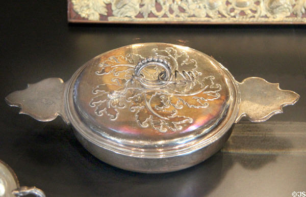 Covered silver bowl with ear handles (1677-87) from Bordeaux, France at Museum of Decorative Arts. Paris, France.