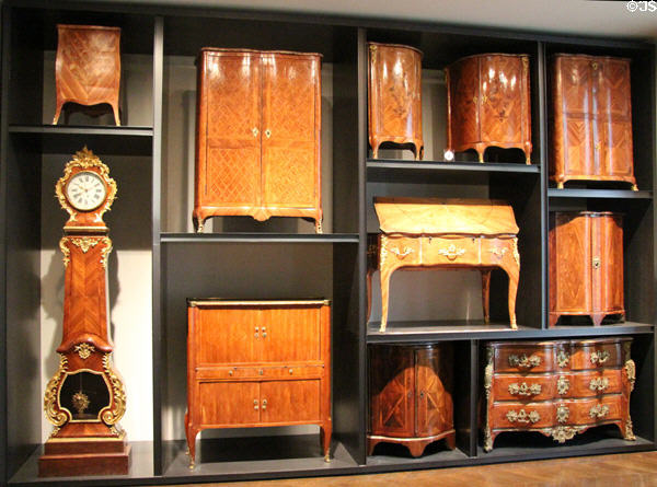 Display of woodgrain patterns on furniture (1700s) at Museum of Decorative Arts. Paris, France.