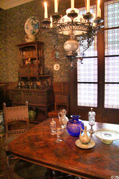 Furniture for Charles Gillot & daughter Marcelle Seure (1880-5) by Eugène Grasset & cabinetmaker Fulgraff of Paris with oriental-style ceramics & glass at Museum of Decorative Arts. Paris, France.