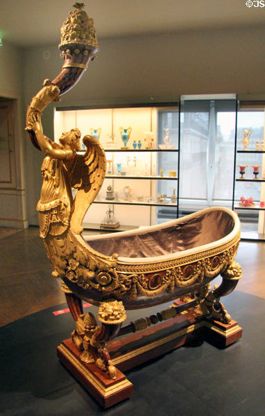 Ceremonial cradle of Duc de Bordeaux (1819) by cabinetmaker Félix Rémond & bronze workers Jean-François Denière & François Thomas Matelin of Paris at Museum of Decorative Arts. Paris, France.