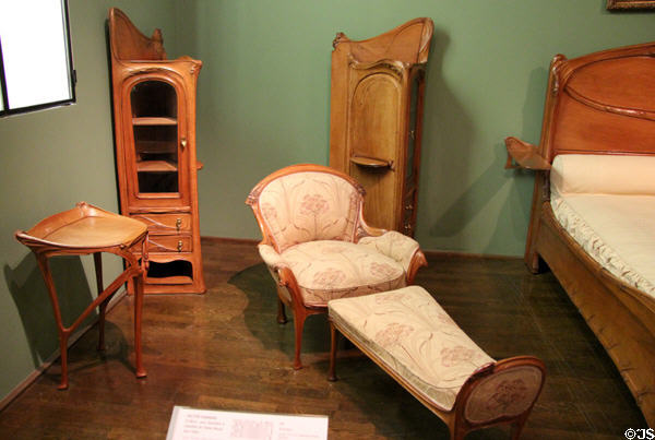 Art Nouveau chaise longue, side table & cabinets for Nozal mansion (c1903) by Hector Guimard of Paris at Museum of Decorative Arts. Paris, France.
