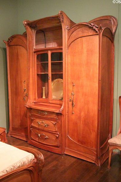 Art Nouveau armoire with center display case for Nozal mansion (c1903) by Hector Guimard of Paris at Museum of Decorative Arts. Paris, France.