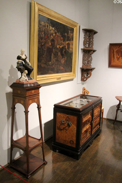 Furniture including large medal cabinet (1900) by Émile Gallé at Museum of Decorative Arts. Paris, France.