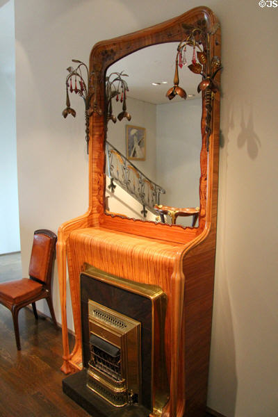 Fireplace & trumeau mirror (1898) by Louis Majorelle of Nancy at Museum of Decorative Arts. Paris, France.