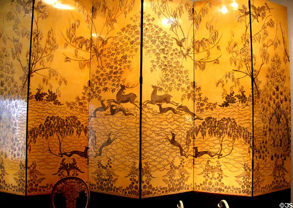 Screen (c1925) with animals running in forest from artist's Apt. by Armand-Albert Rateau at Museum of Decorative Arts. Paris, France.