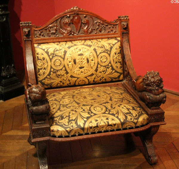 Sculpted armchair (c1875) by Luigi Frullini of Florence at Museum of Decorative Arts. Paris, France.