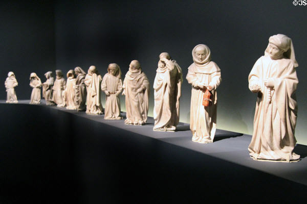 Alabaster tears sculpture group (1443-70) of monks to cry at tomb of Jean the Fearless, duc de Bourgogne by Jean de la Huerta at Cluny Museum. Paris, France.