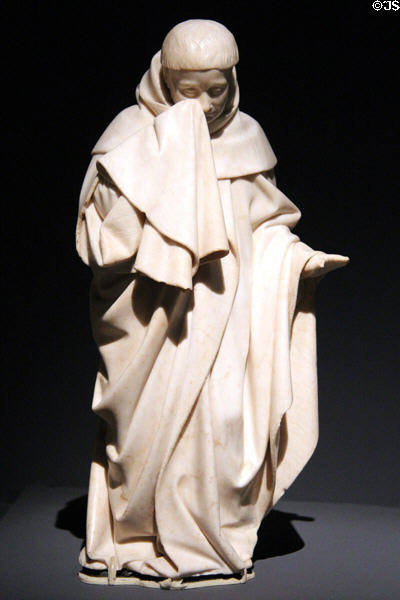 Mourner from Alabaster tears sculpture group (1443-70) by Jean de la Huerta at Cluny Museum. Paris, France.