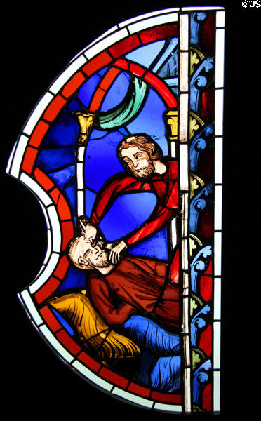 Blinding of Samson stained glass window from Sainte-Chapelle in Paris at Cluny Museum. Paris, France.