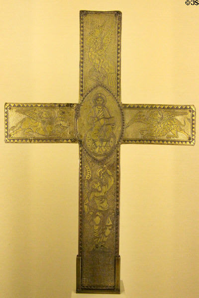 Gilded copper cross with Christ & Evangelist symbols (early 12thC) from Italy? at Cluny Museum. Paris, France.