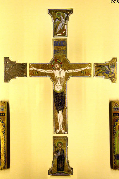 Enameled plaques of cross with Christ & Evangelist symbols (1185-95) from Limoges at Cluny Museum. Paris, France.