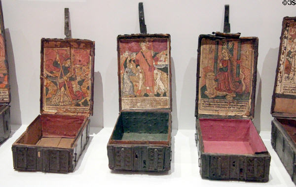 Wooden boxes with scenes of Sts Christopher, Rock & Marguerite (end 15thC) after Jean d'Ypres from Paris at Cluny Museum. Paris, France.
