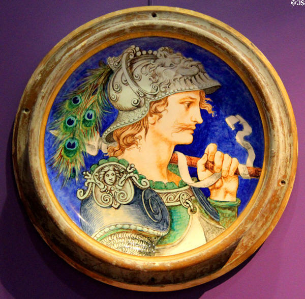 Ceramic plate (1869) showing armored Renaissance soldier in imitation of majolica style by Emile Erhmann with Théodore Deck from Sèvres at Petit Palace Museum. Paris, France.