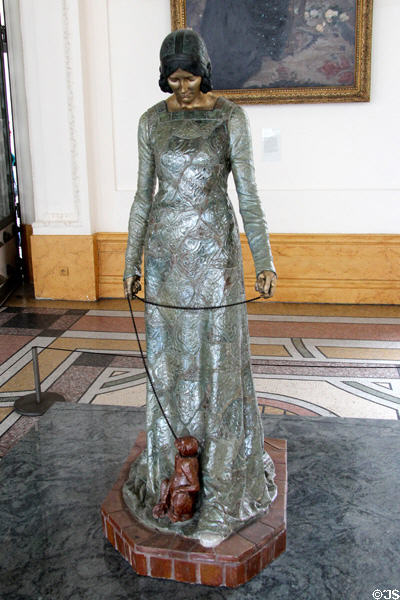 Woman with monkey ceramic & bronze sculpture (1908) by Camille Alaphilippe at Petit Palace Museum. Paris, France.