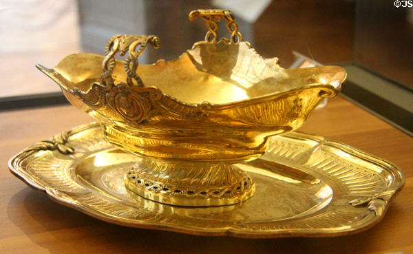 Gilded silver sauce dish (1775-6) by Claude-Nicolas Delanoy & platter (1776-7) by Charles-Louis-Auguste Friman at Petit Palace Museum. Paris, France.