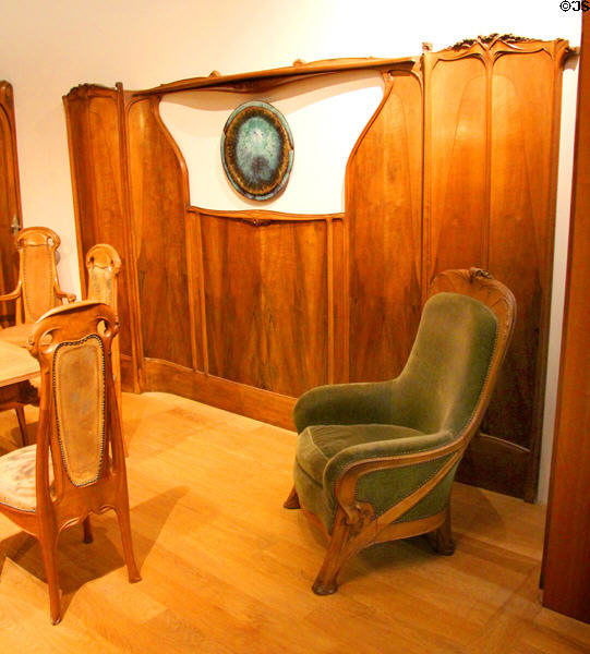 Guimard dining room wall section & armchair (c1909) by Hector Guimard at Petit Palace Museum. Paris, France.