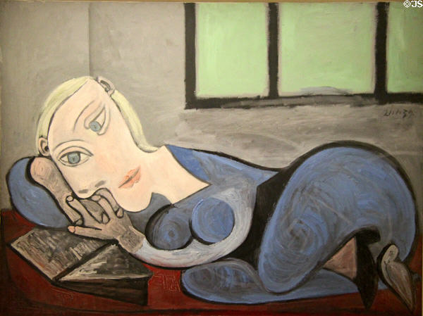 woman reading while reclining painting (1939) by Pablo Picasso at Picasso Museum. Paris, France.