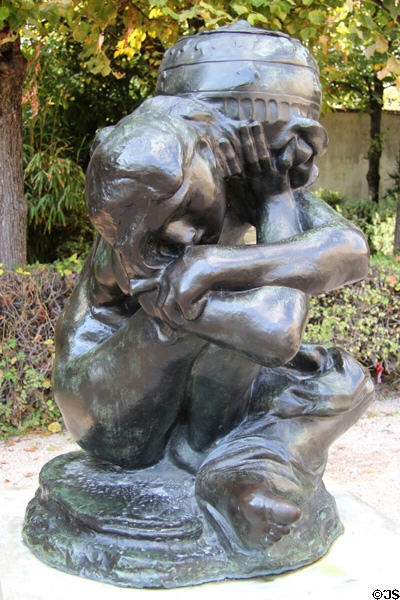 Fallen Caryatid with Urn bronze sculpture (1918) by Auguste Rodin at Rodin Museum Garden. Paris, France.