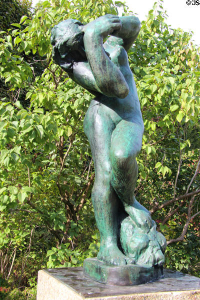 Bronze sculpture of nude female by Auguste Rodin at Rodin Museum Garden. Paris, France.