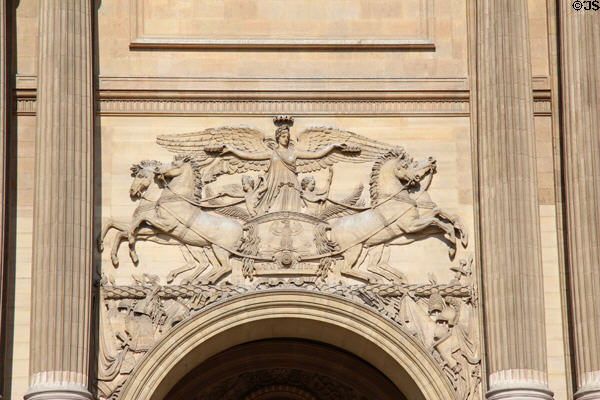 Victory distributing Crowns relief (1807) by Pierrer Cartellier on Colonnade of Louvre Palace. Paris, France.