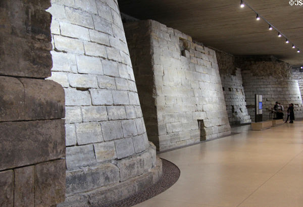 Ancient fortified walls excavated under Louvre Museum. Paris, France.
