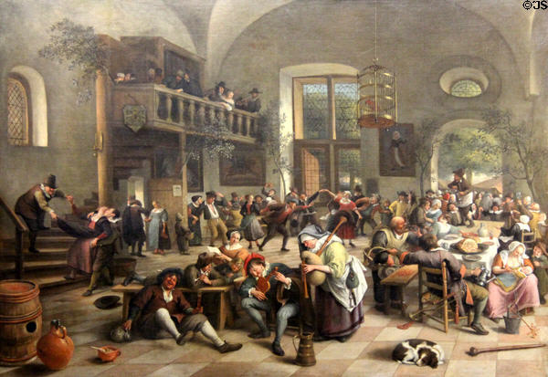 Celebration in an Inn painting (1674) by Jan Steen of Leyden at Louvre Museum. Paris, France.