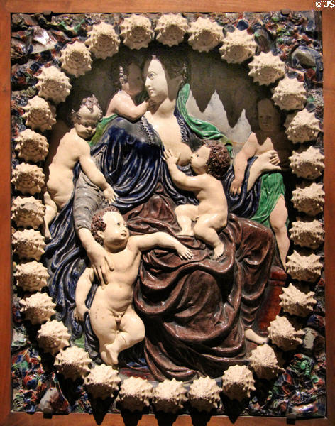 Charity glazed clay plaque (end 16th - start 17thC) by Fontainebleau (Avon?) workshop at Louvre Museum. Paris, France.
