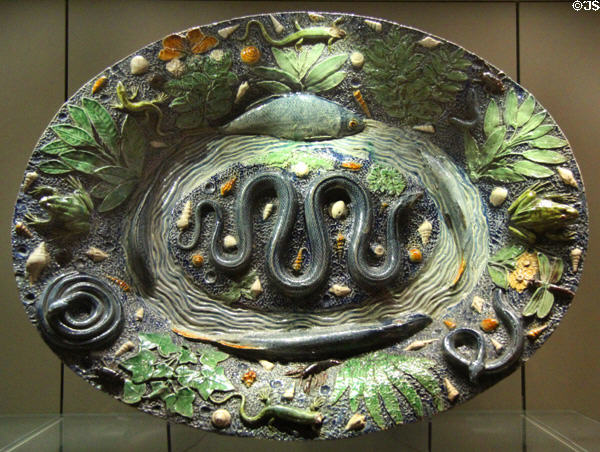 Rustic glazed clay basin (end 16th - start 17thC) at Louvre Museum. Paris, France.